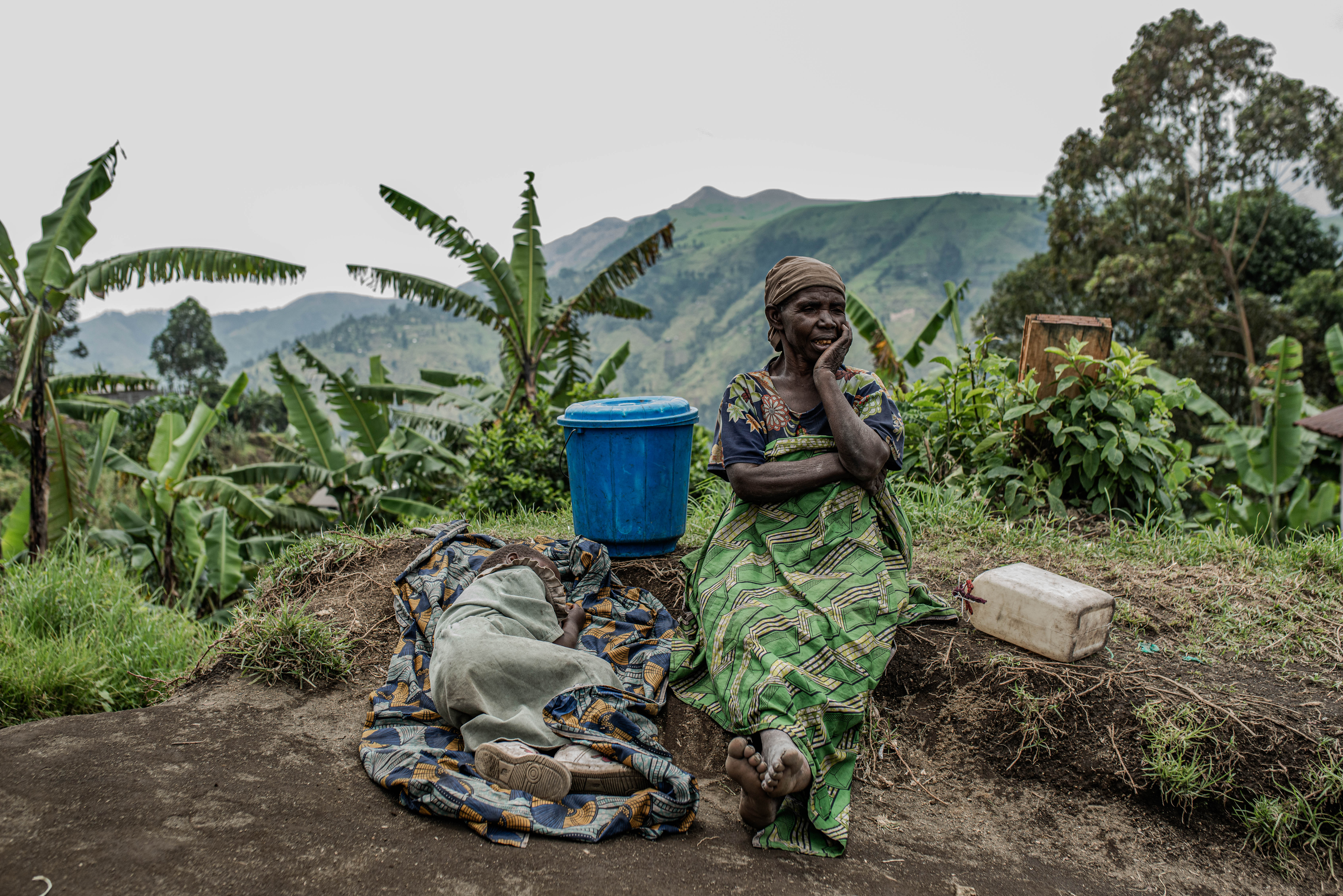 woman sitting down on a trunk