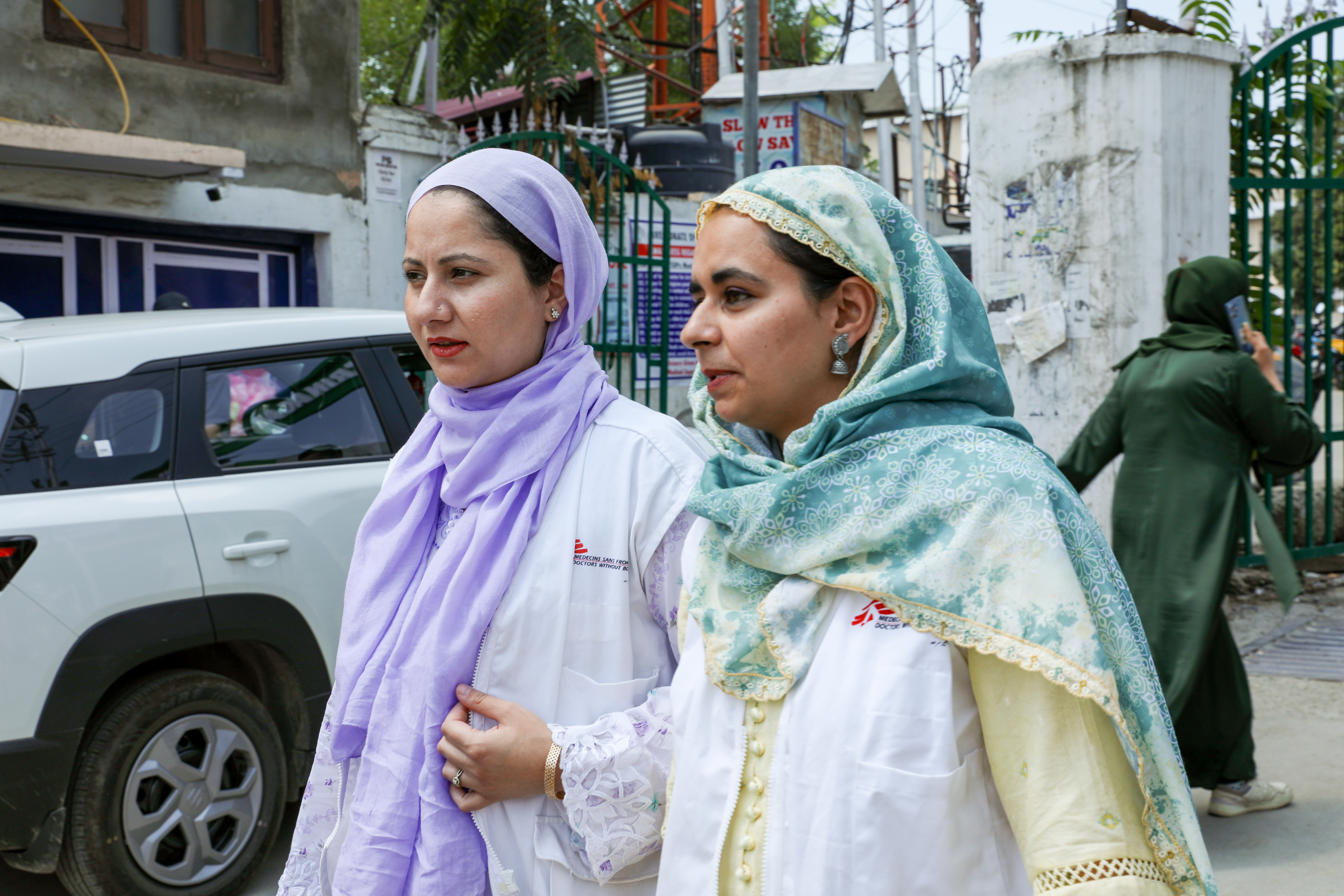 2 msf employees walking