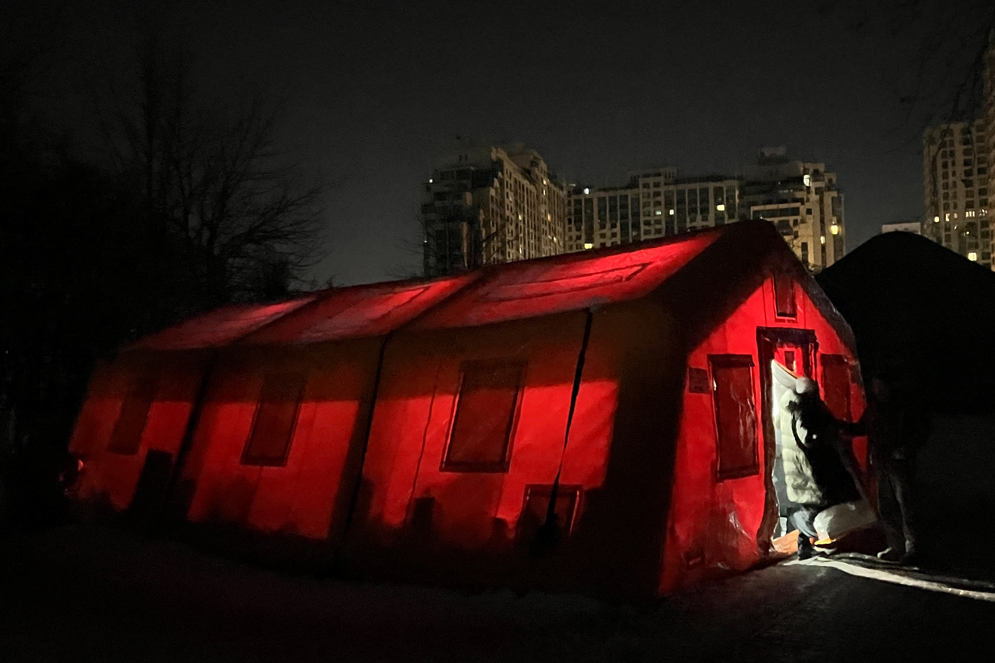 Tent in the snow at night