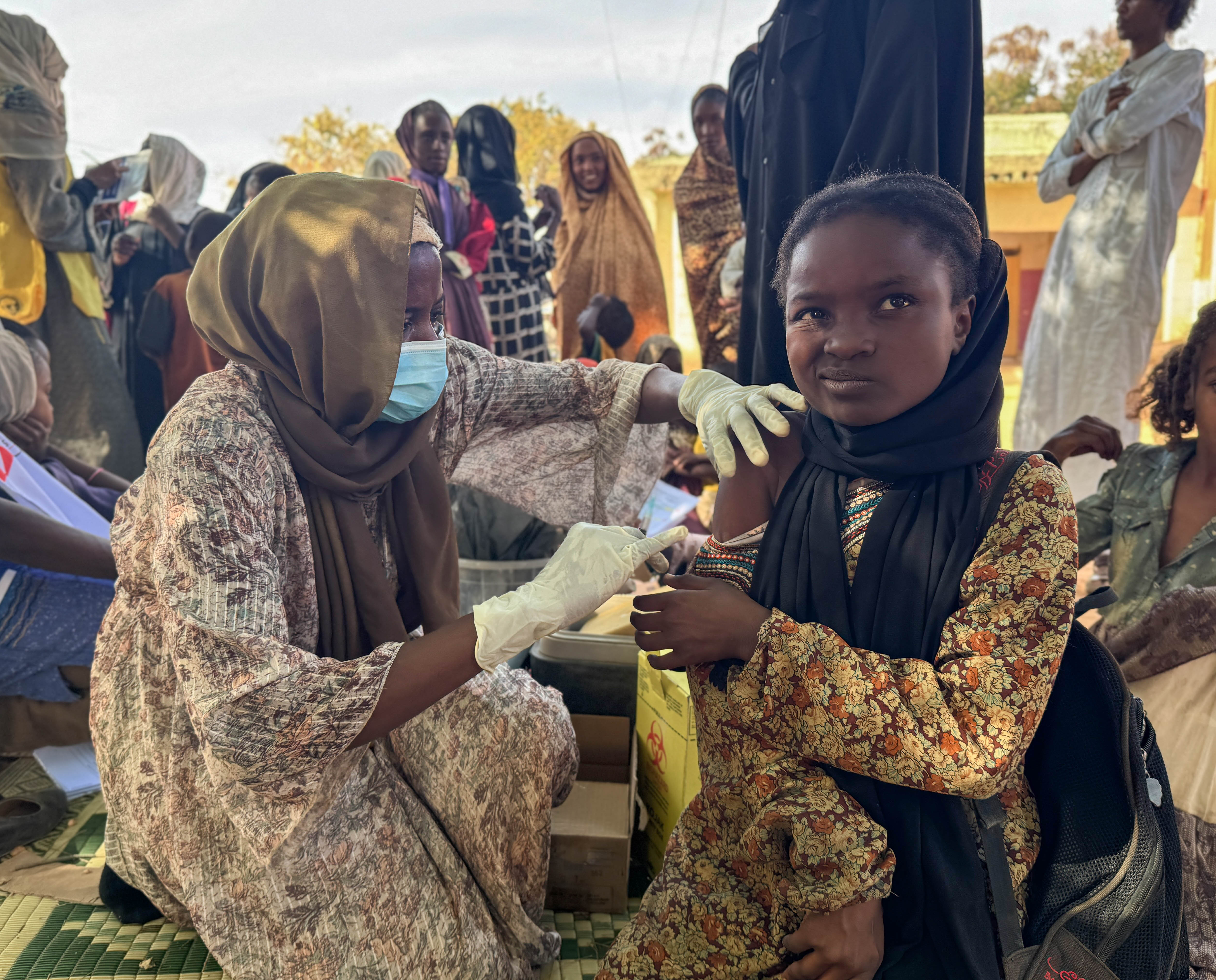 Ten-year-old Mawa at the vaccination site in Alsafa, El Geneina. After her teachers told the students that everyone must be vaccinated, she attended the campaign with her four brothers and saw two of her school friends there.