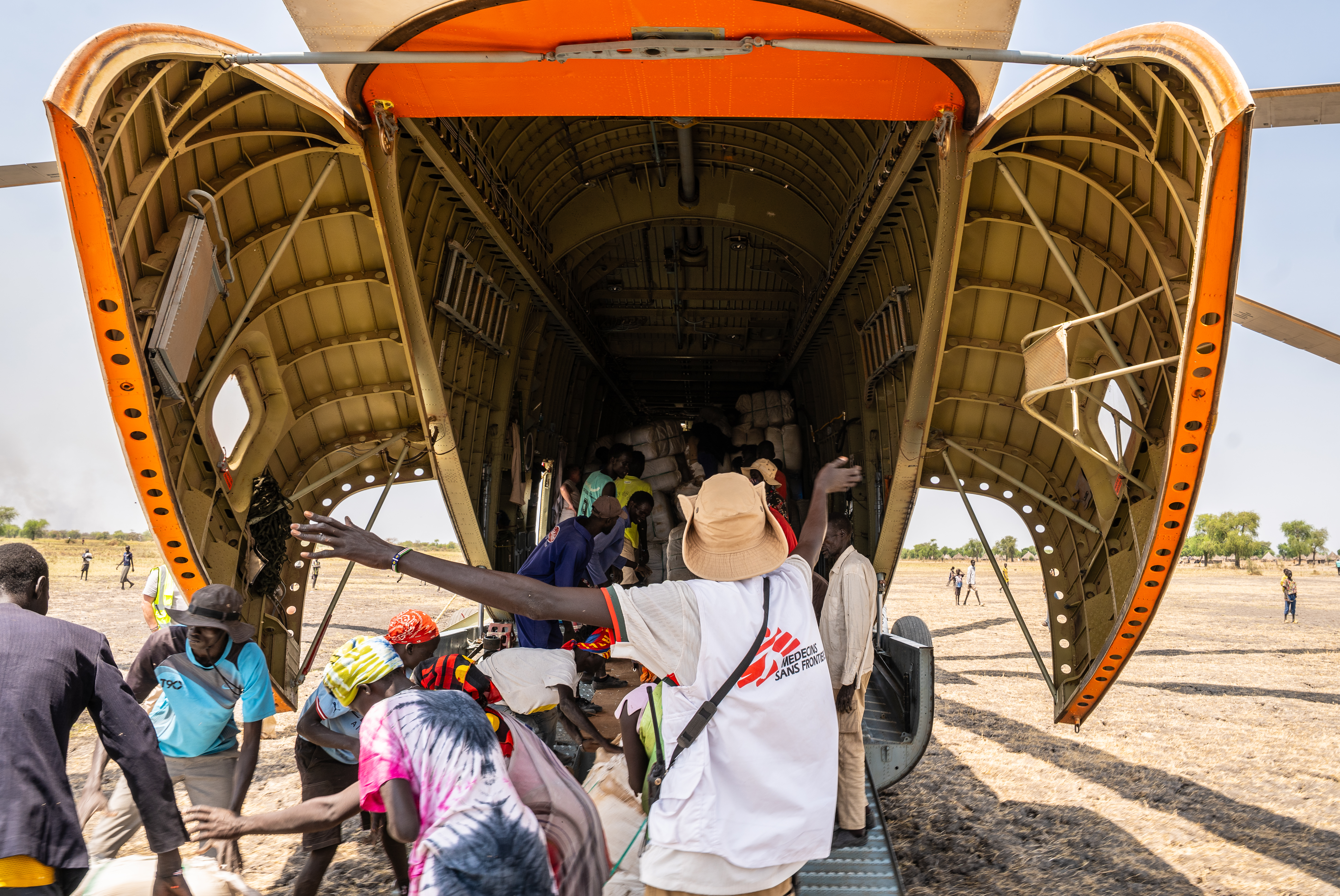 MSF staffs offload non-food relief items transported by a United Nations Mi-26 helicopter in Chuil, Jonglei State, South Sudan