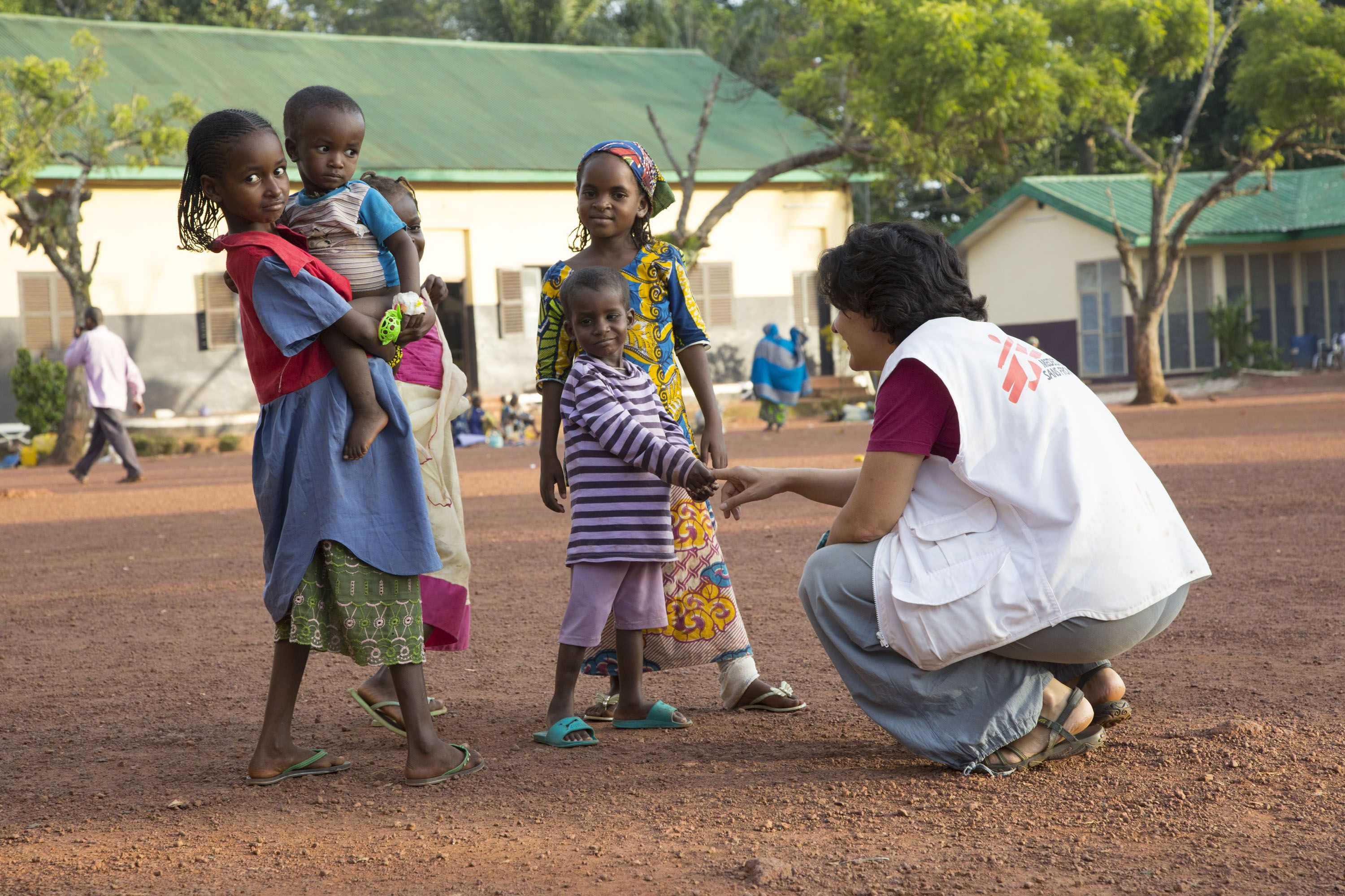 Mirjam Markwalder with children outside the intensive therapeutic feeding center in Batouri, Cameroon.