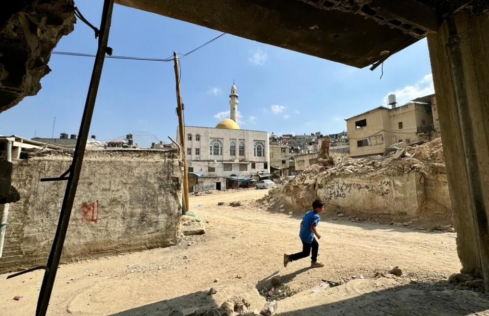 while the world looks away