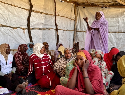 women talking in a circle